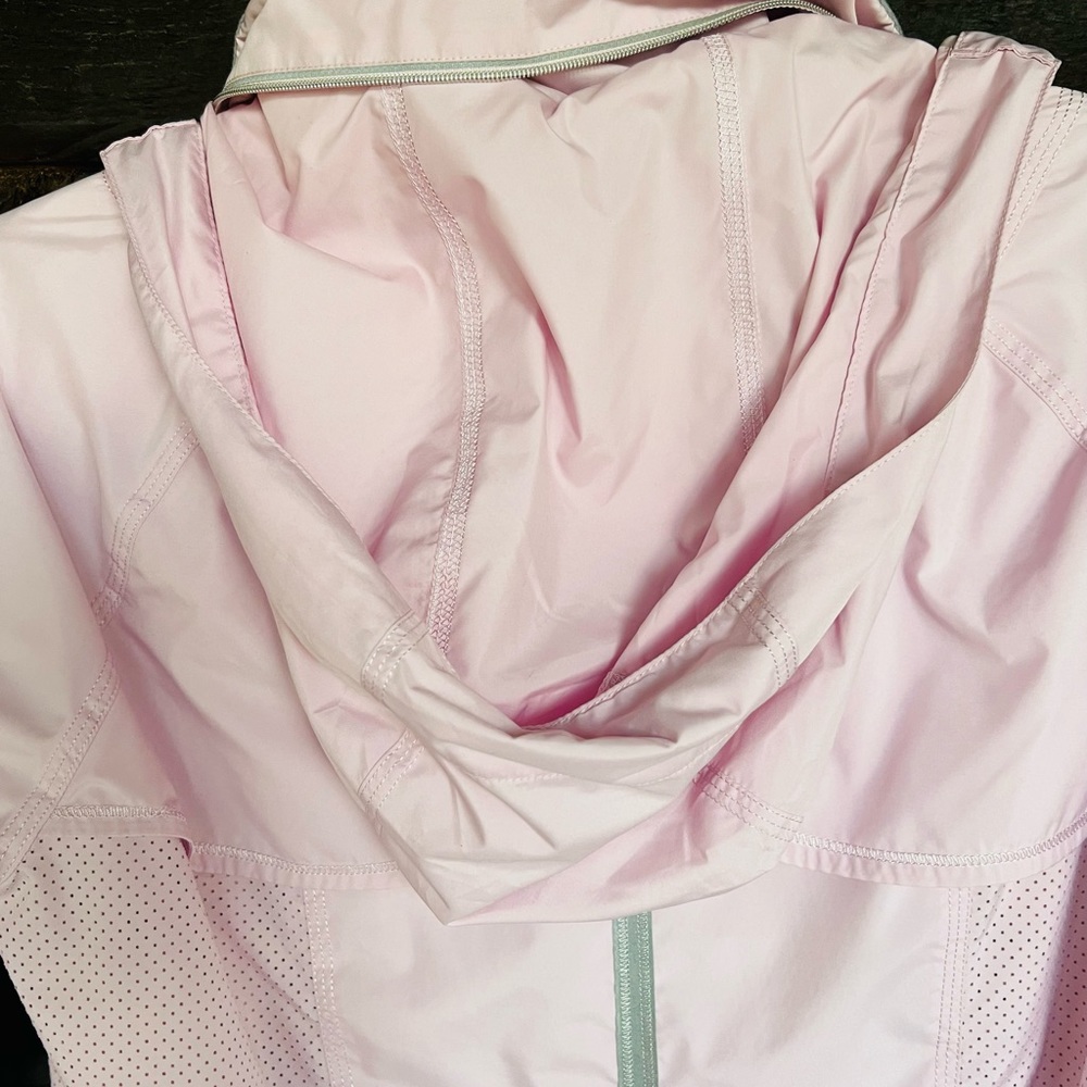 Baby pink lululemon “run the record” wind breaker
